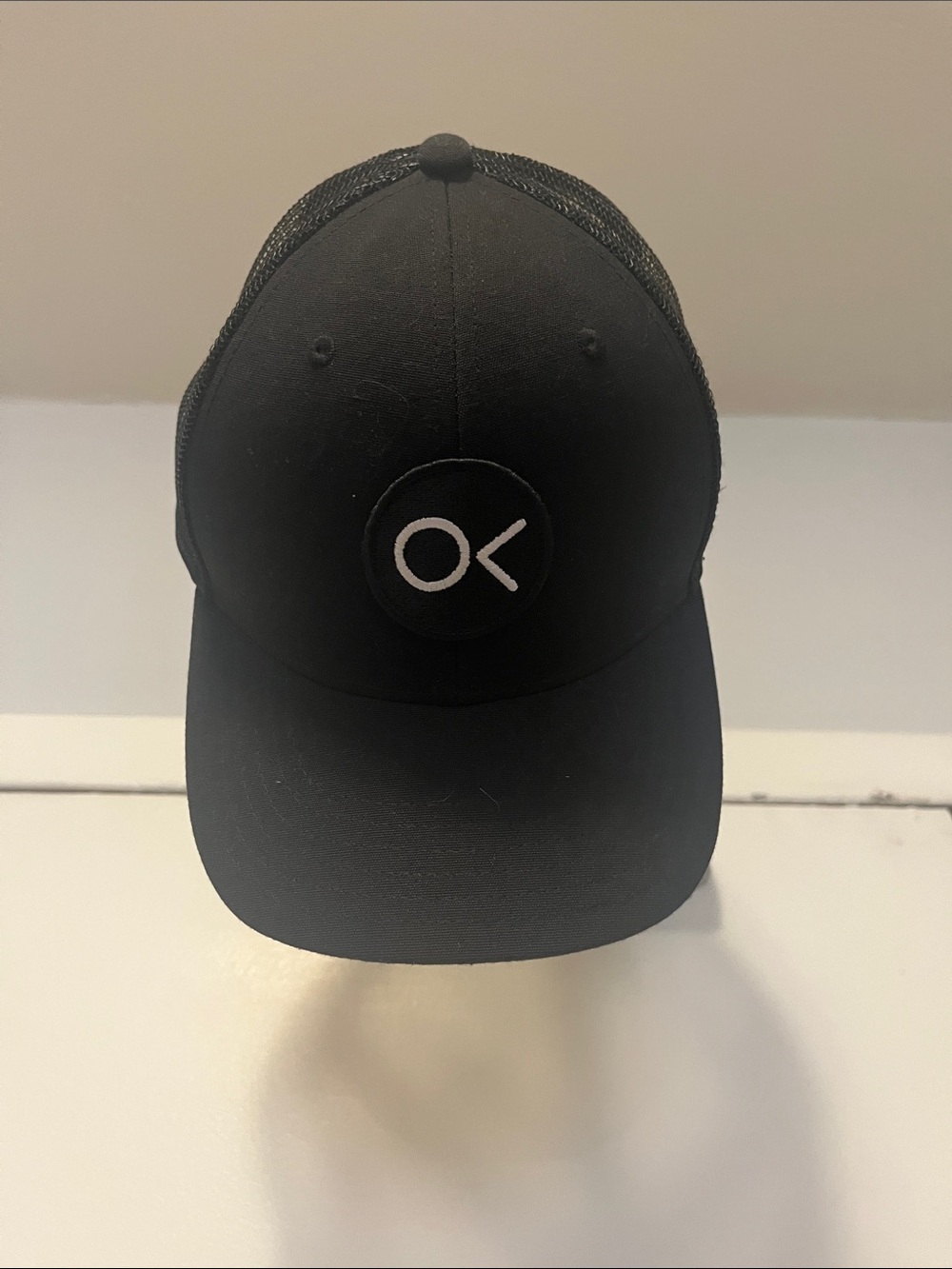Outerknown Black Trucker Hat with White OK Logo